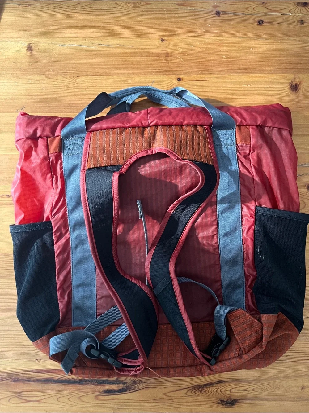 Classic Patagonia Red Tote with Gray Straps and Black Pockets